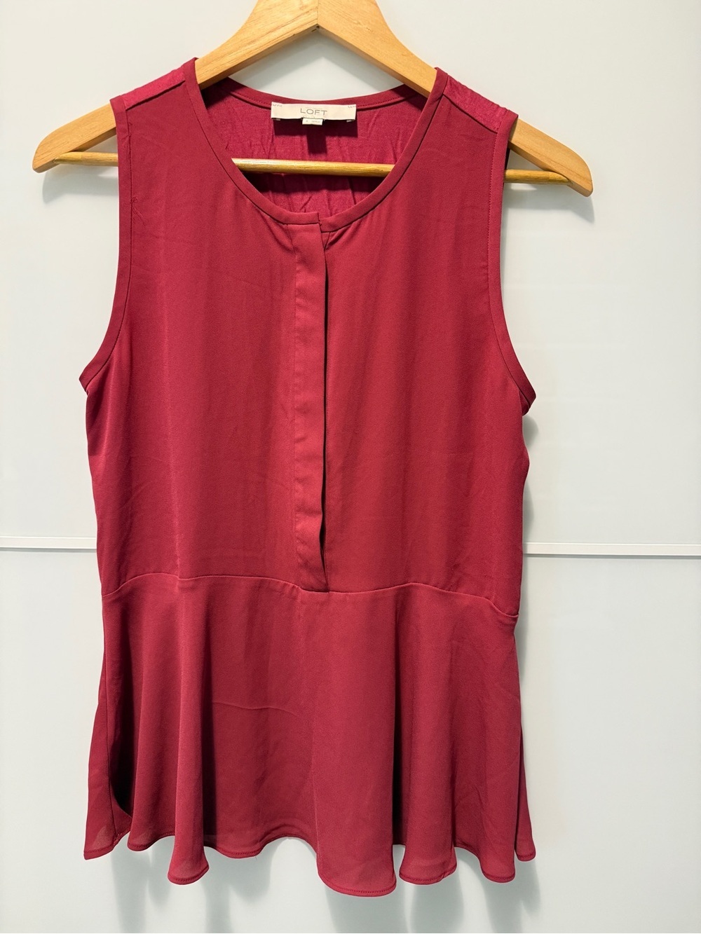 LOFT Sleeveless Peplum Blouse in Berry